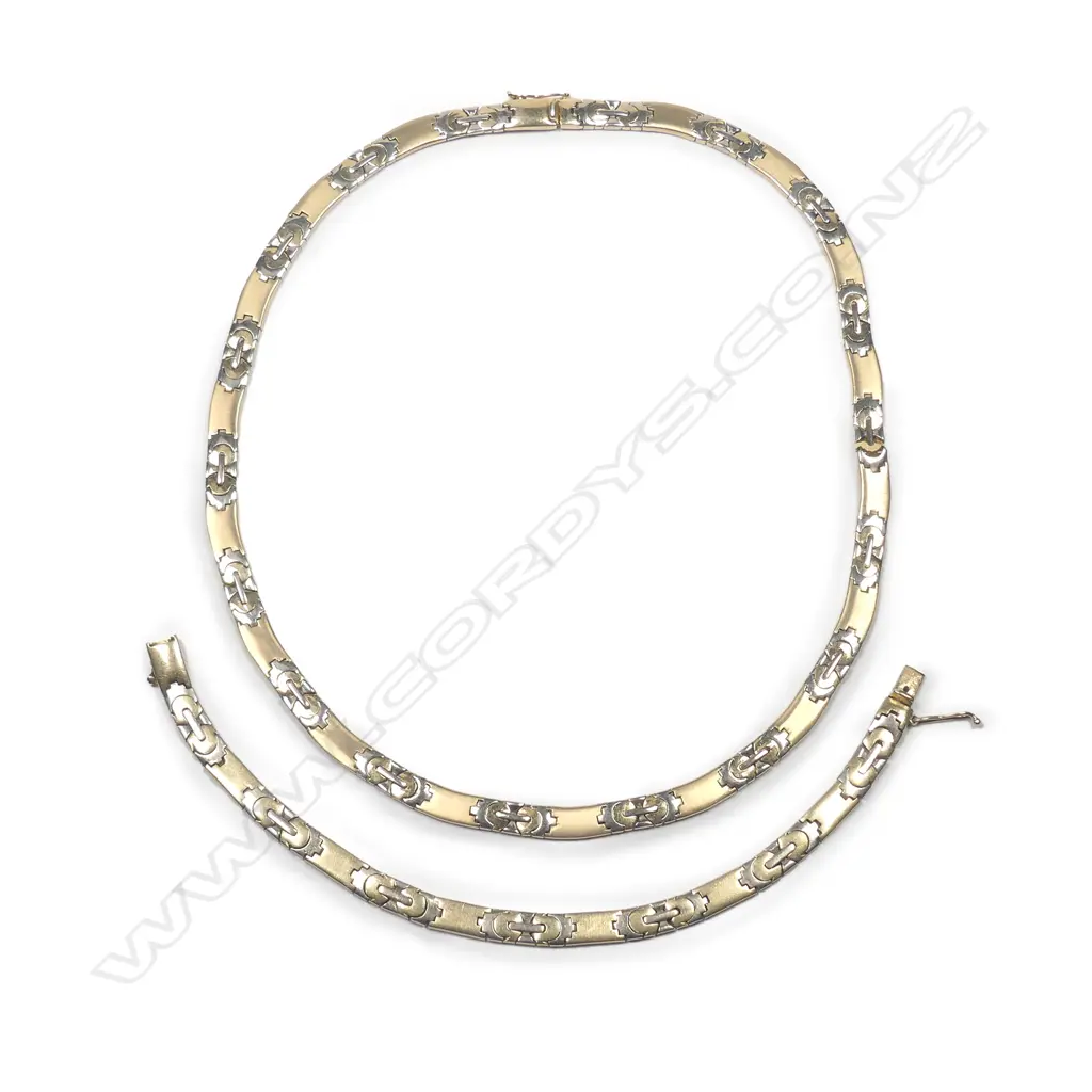 A 14ct yellow and white gold necklace and bracelet set Image 1++