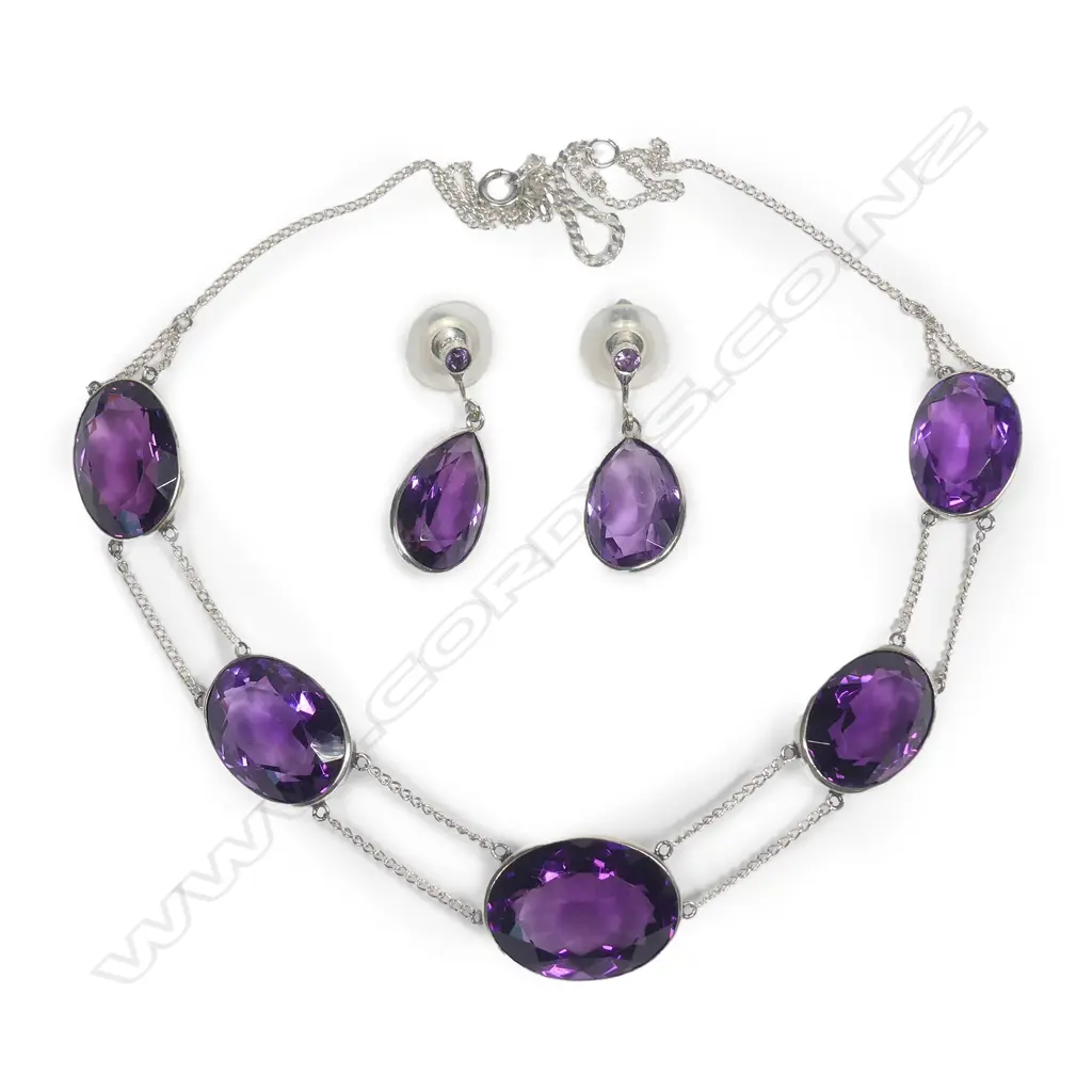 An impressive silver and amethyst necklace and earring set Image 1++