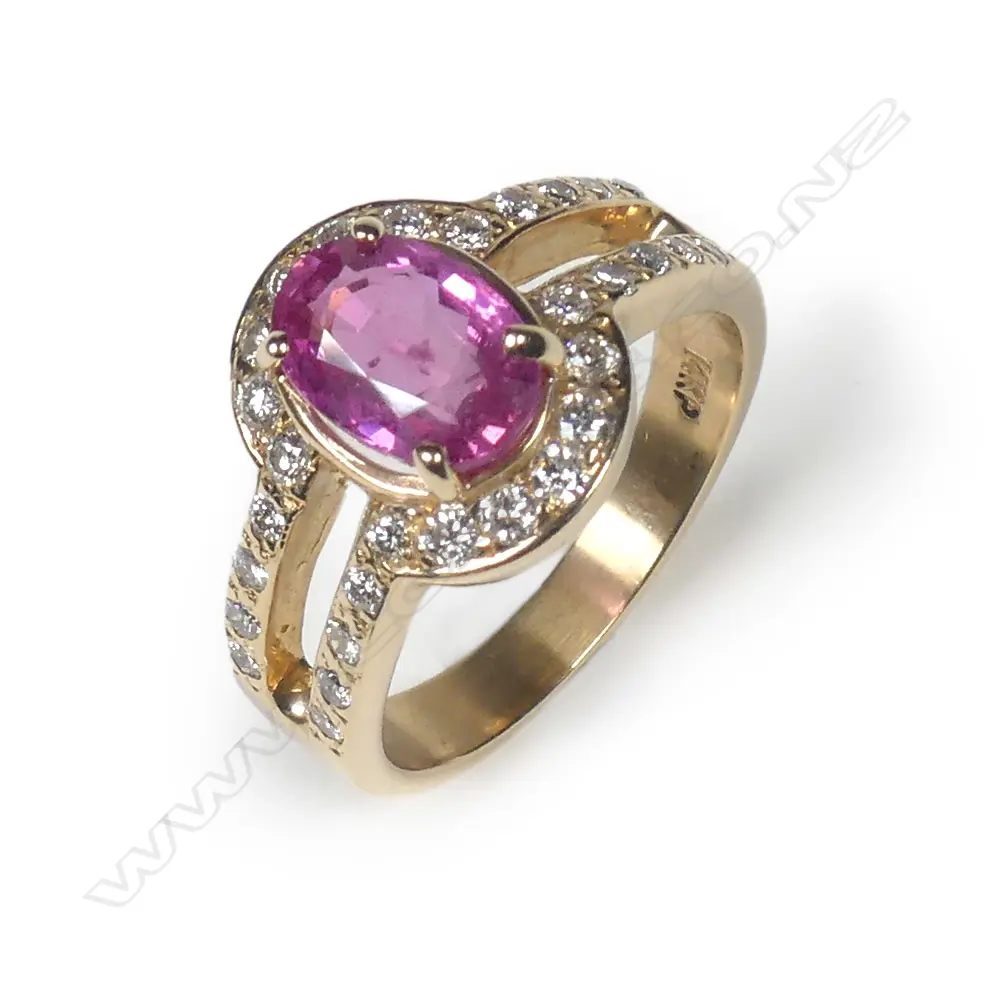 A 14ct gold pink sapphire and diamond ring Image 1++