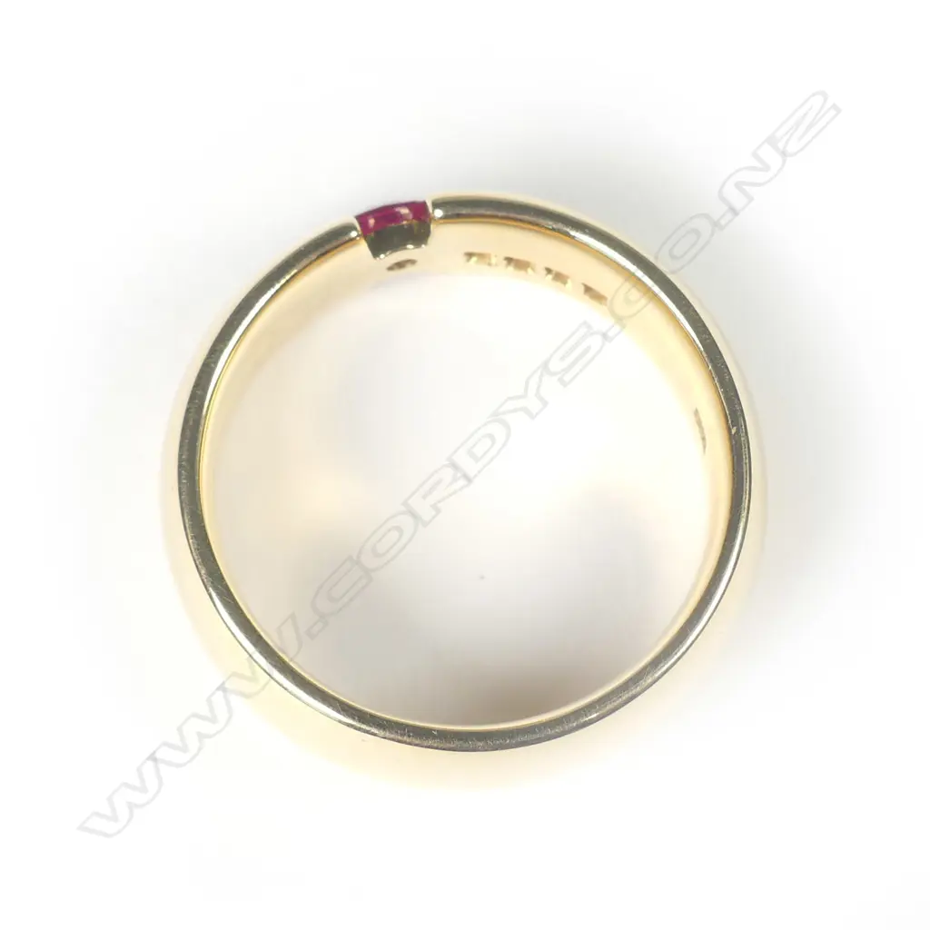 A 18ct gold ruby and diamond ring Image 1++