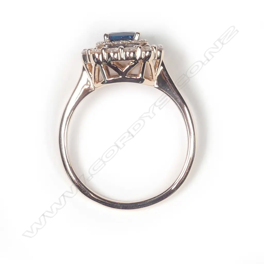A 14ct rose gold diamond double halo ring Image 1++