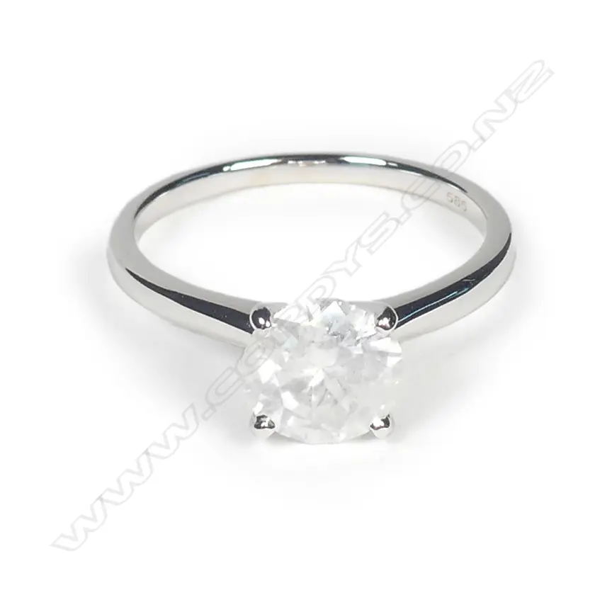 A 14ct white gold diamond solitaire ring Image 1++