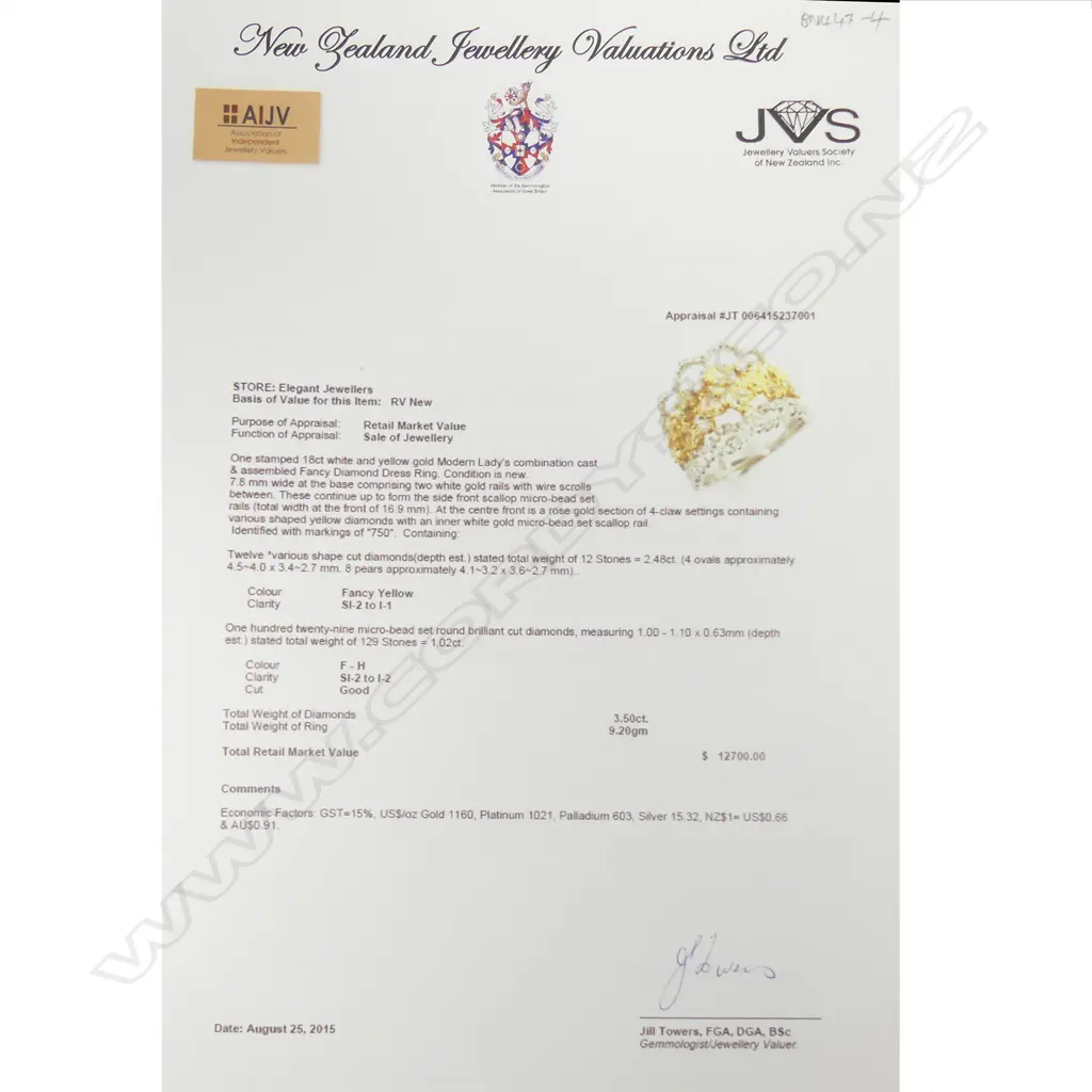 An 18ct. white gold fancy yellow and white diamond wide ring Image 1++