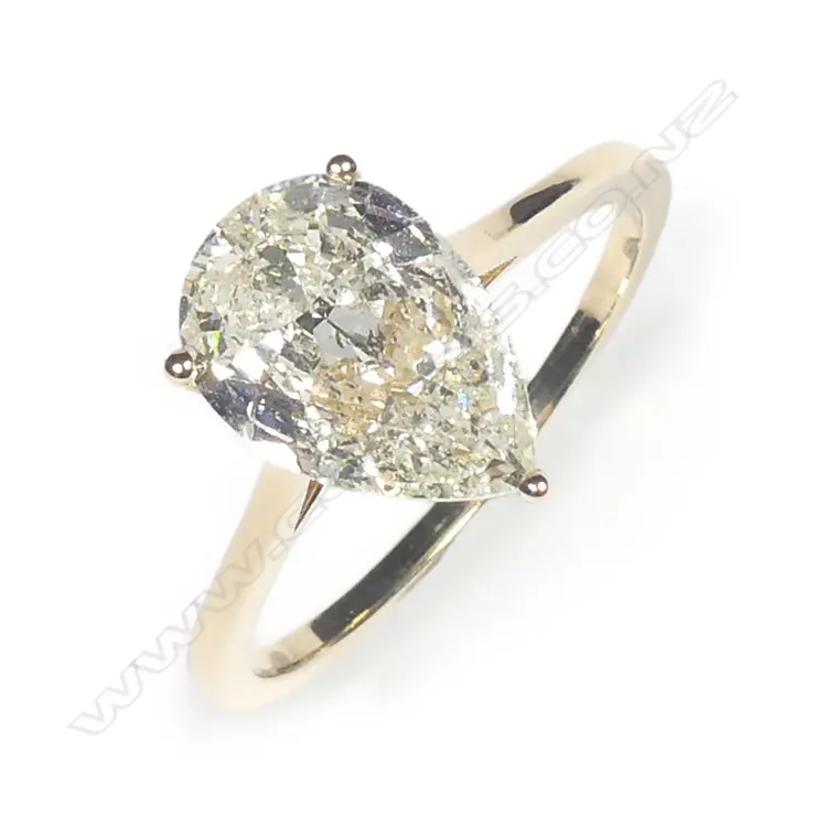 A 14ct gold diamond solitaire ring Image 1++