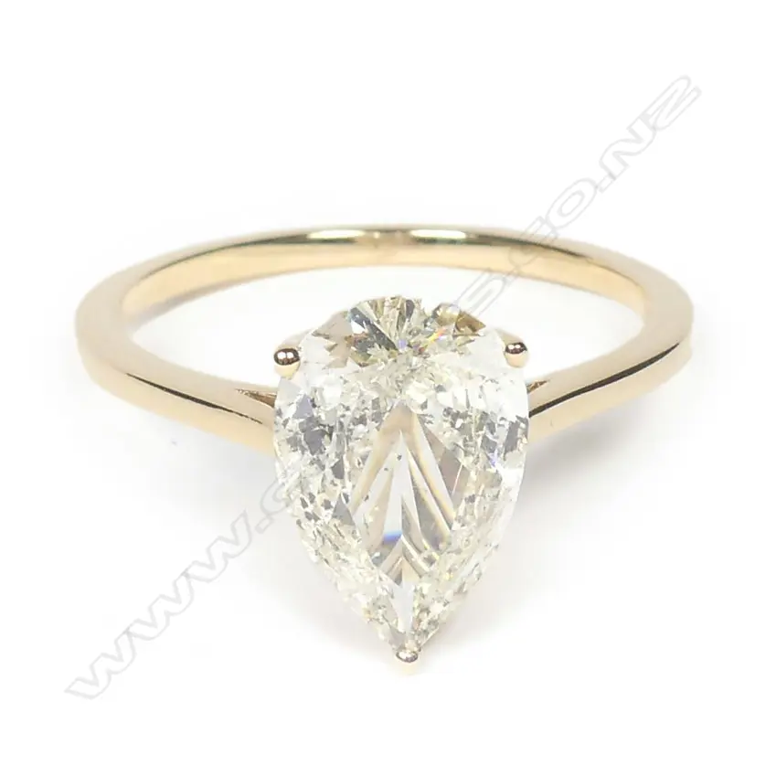 A 14ct gold diamond solitaire ring Image 1++