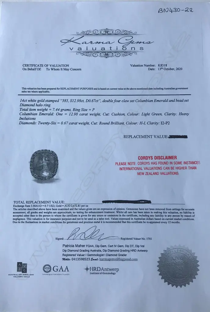 A 14ct white gold Columbian emerald and diamond ring Image 1++