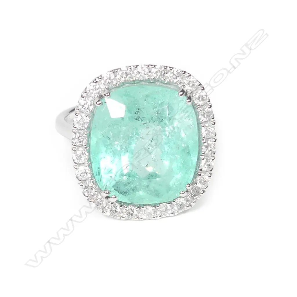 A 14ct white gold Columbian emerald and diamond ring Image 1++