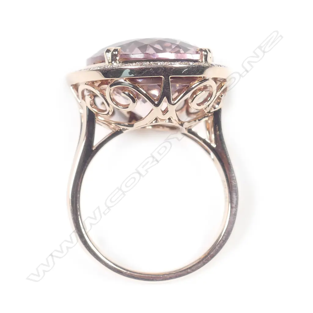 A 14ct rose gold morganite and diamond ring Image 1++