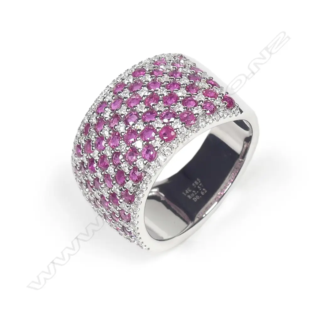 A 14ct white gold ruby and diamond cluster ring Image 1++