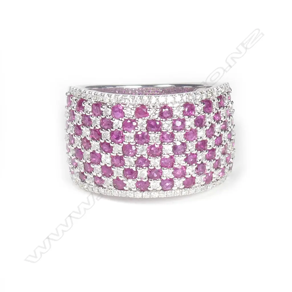 A 14ct white gold ruby and diamond cluster ring Image 1++