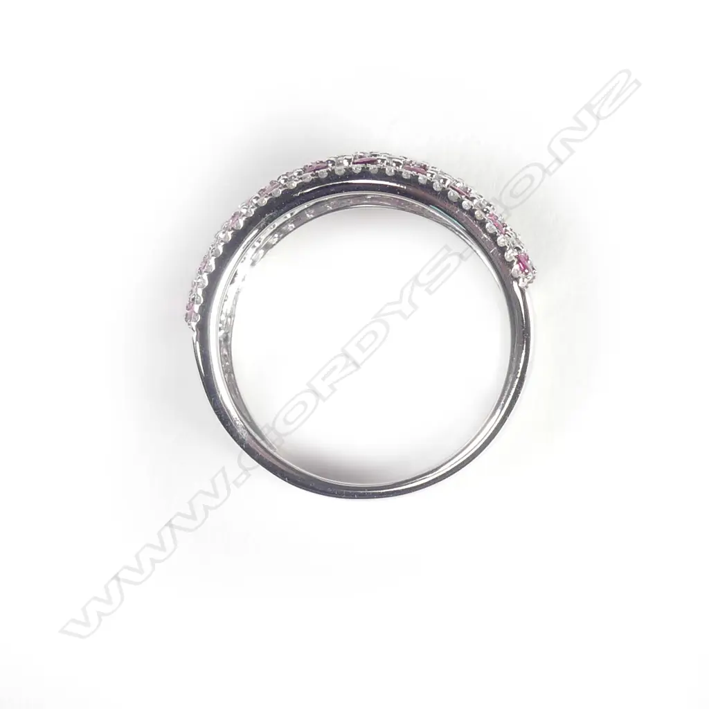 A 14ct white gold ruby and diamond cluster ring Image 1++