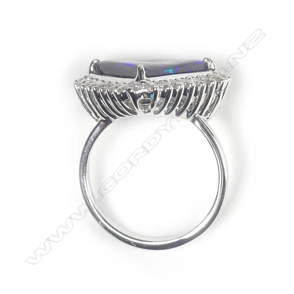 A 14ct white gold opal and diamond ring Image 1++