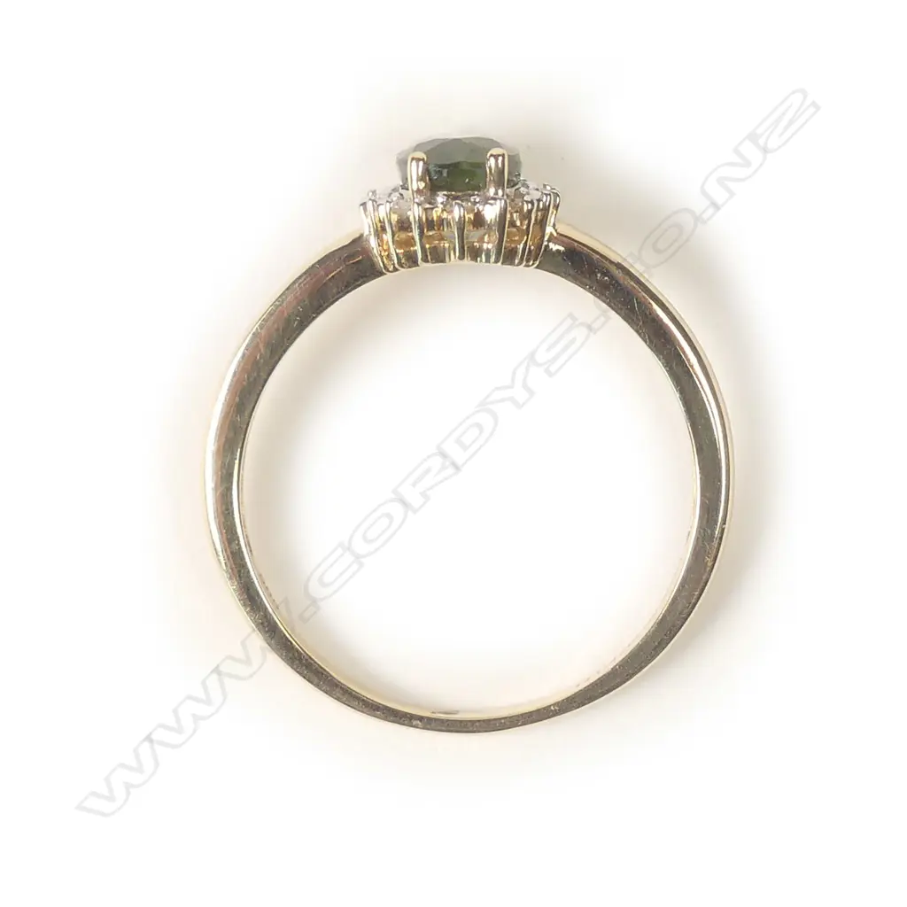 A 14ct gold sapphire and diamond ring Image 1++