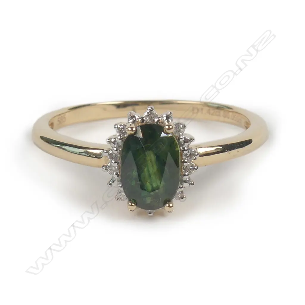 A 14ct gold sapphire and diamond ring Image 1++