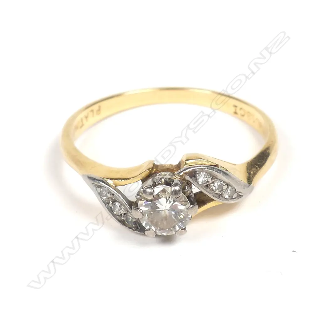 A vintage 18ct diamond solitaire ring Image 1++