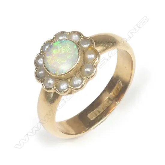 A vintage 18ct opal and seed pearl ring