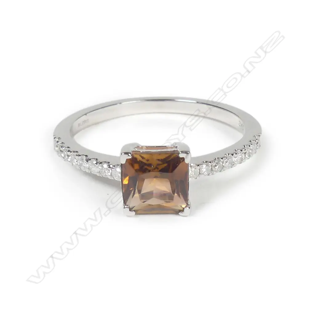 A 9ct white gold tourmaline and diamond ring Image 1++
