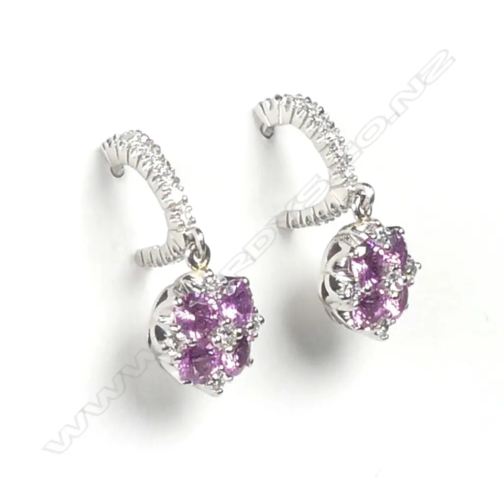 A pair of platinum diamond and pink sapphire earrings Image 1++