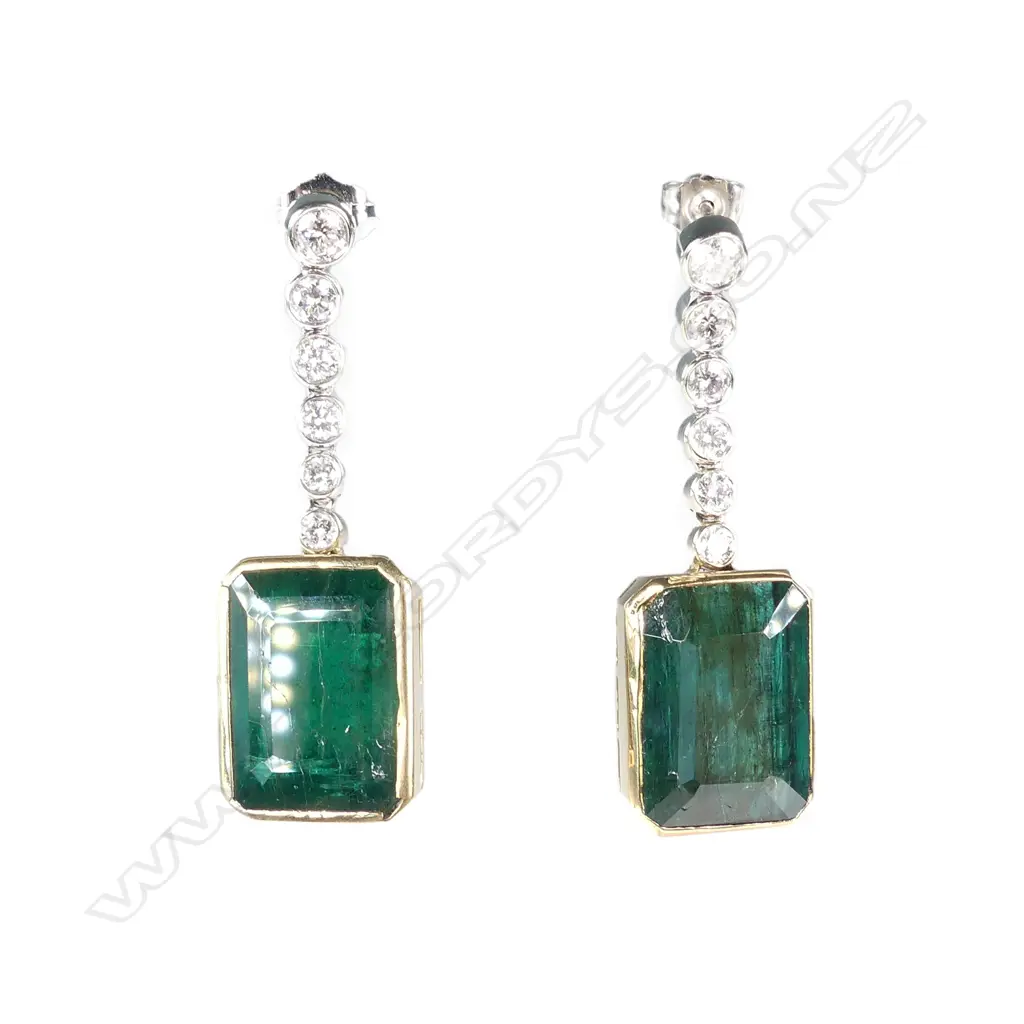 A pair of 14ct white and yellow gold emerald and diamond drop earrings Image 1++