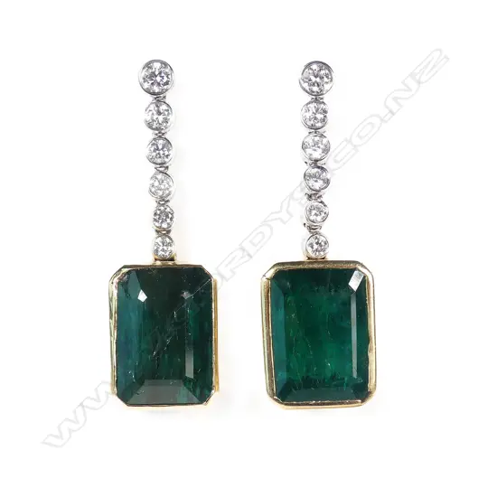 A pair of 14ct white and yellow gold emerald and diamond drop earrings
