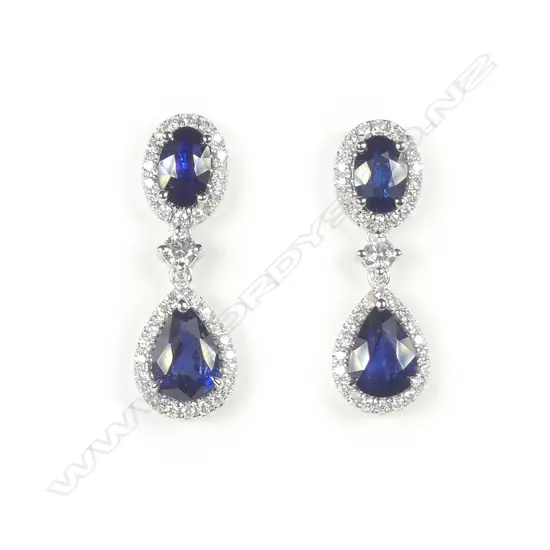 A pair of platinum sapphire and diamond drop earrings
