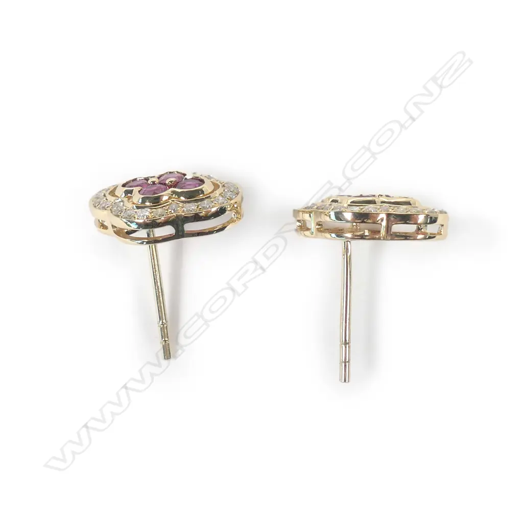 A pair of 14ct gold ruby and diamond earrings Image 1++