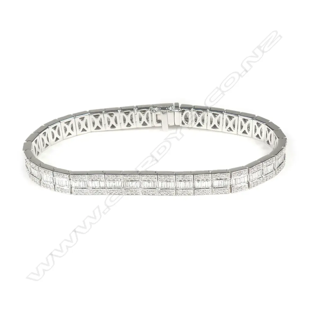 An 18ct white gold and diamond bracelet Image 1++