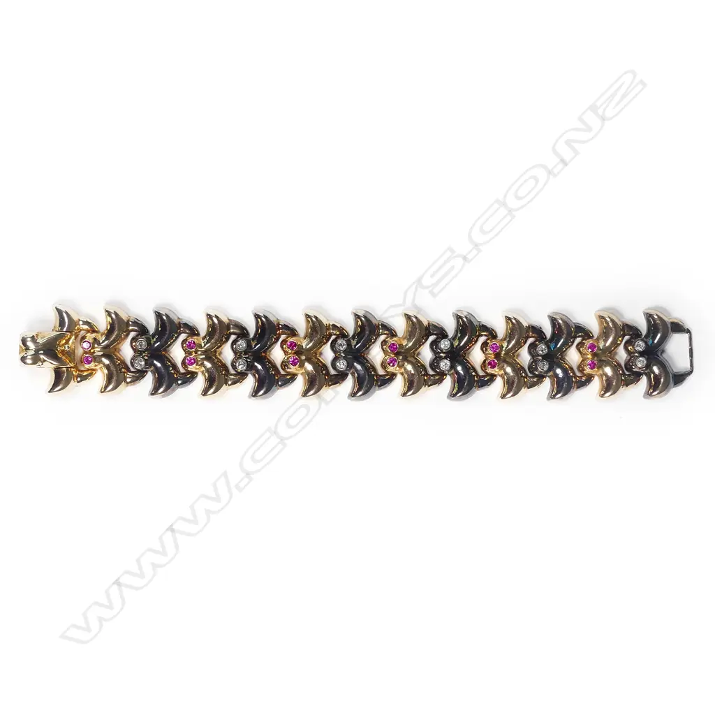 An 18ct gold ruby and diamond bracelet Image 1++