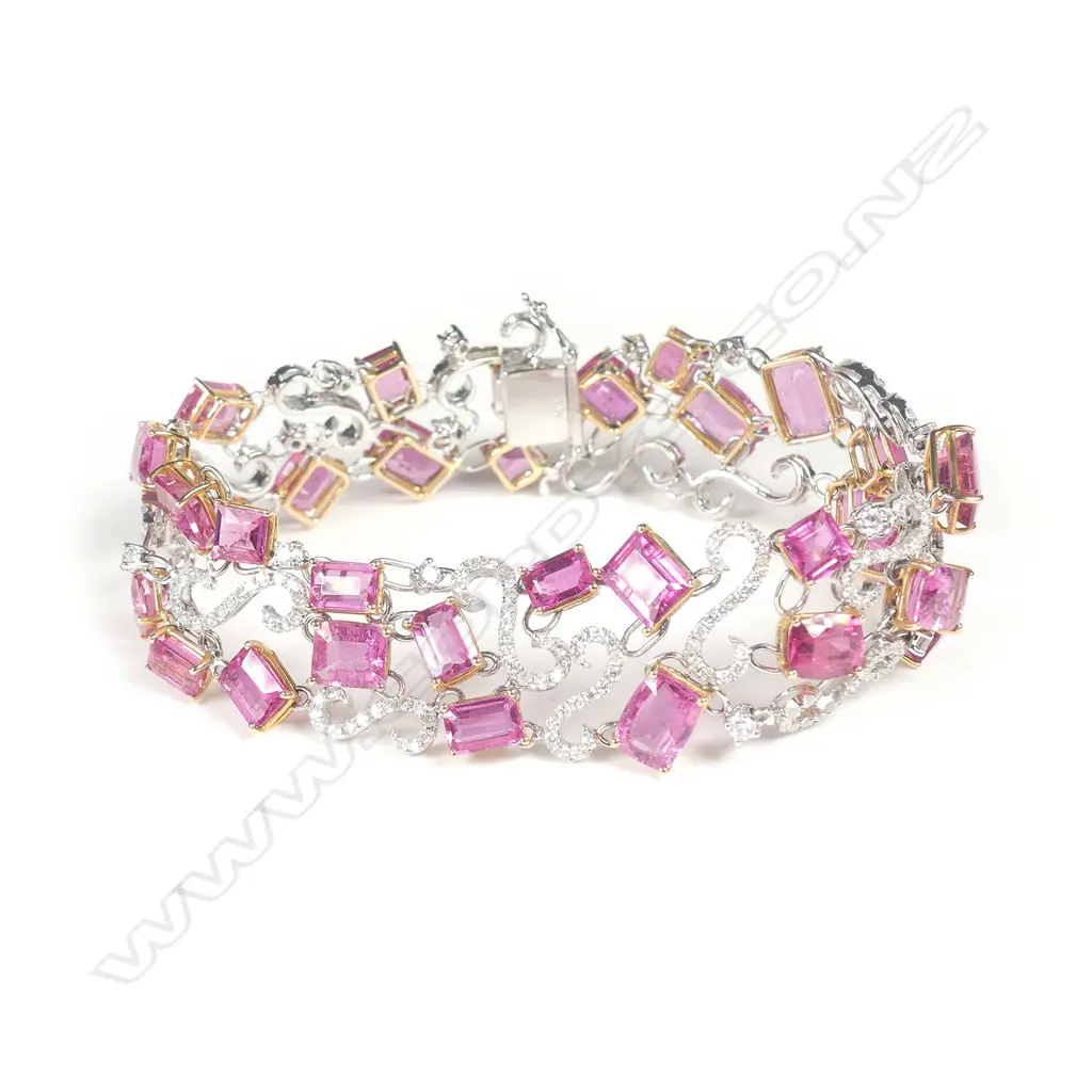 A fancy 18ct. white gold rubellite and diamond set wide bracelet Image 1++