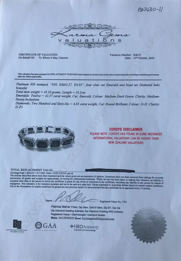 A platinum emerald and diamond halo bracelet Image 1++