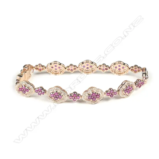 A 14ct rose gold ruby and diamond bracelet