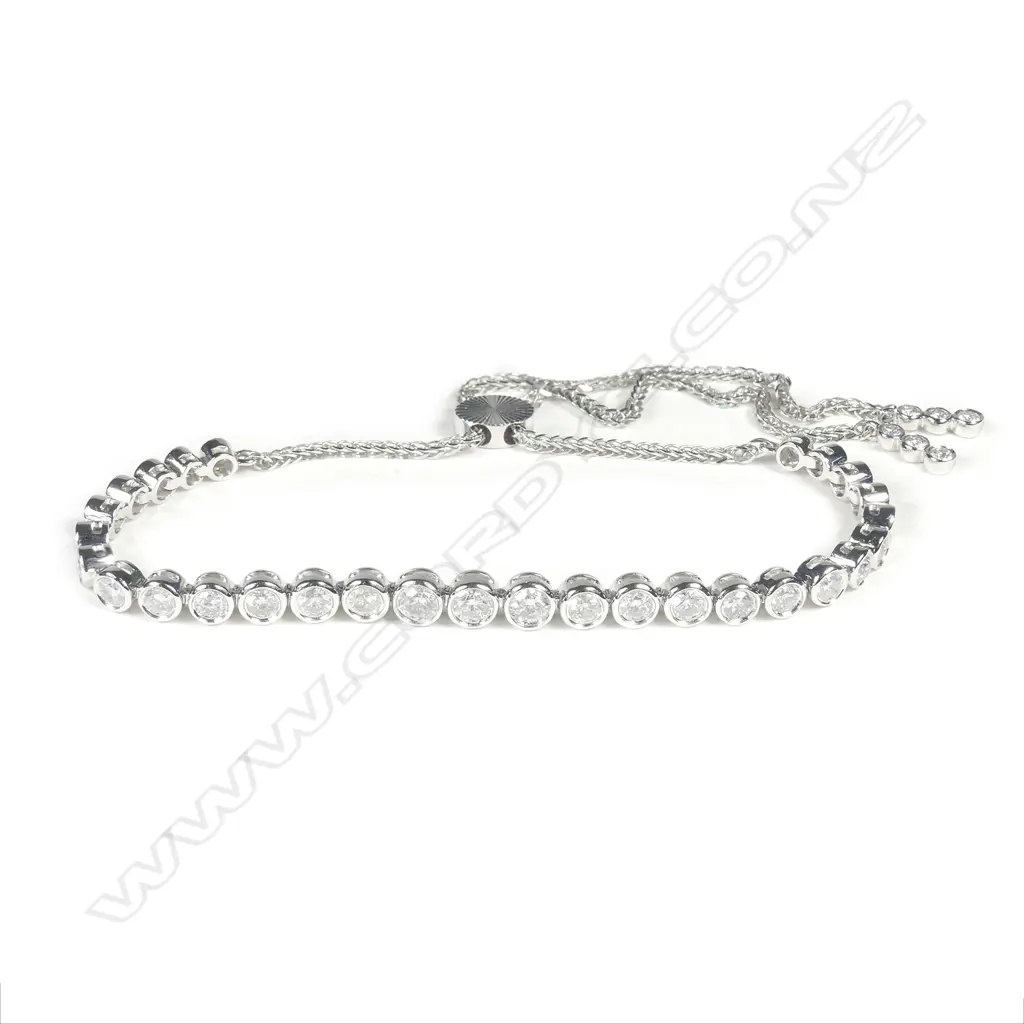 A 14ct white gold diamond bolo bracelet Image 1++