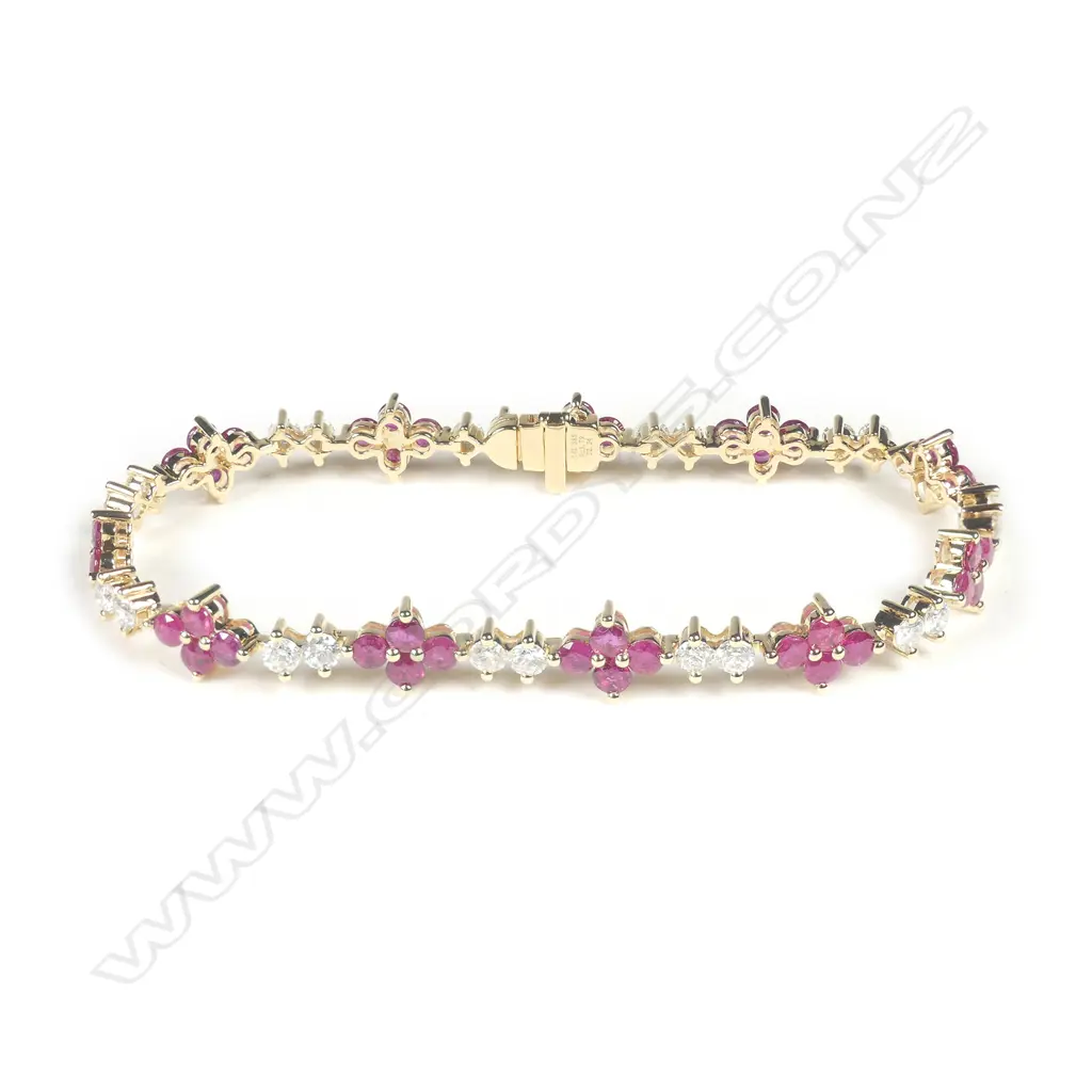 A 14ct gold ruby and diamond bracelet Image 1++