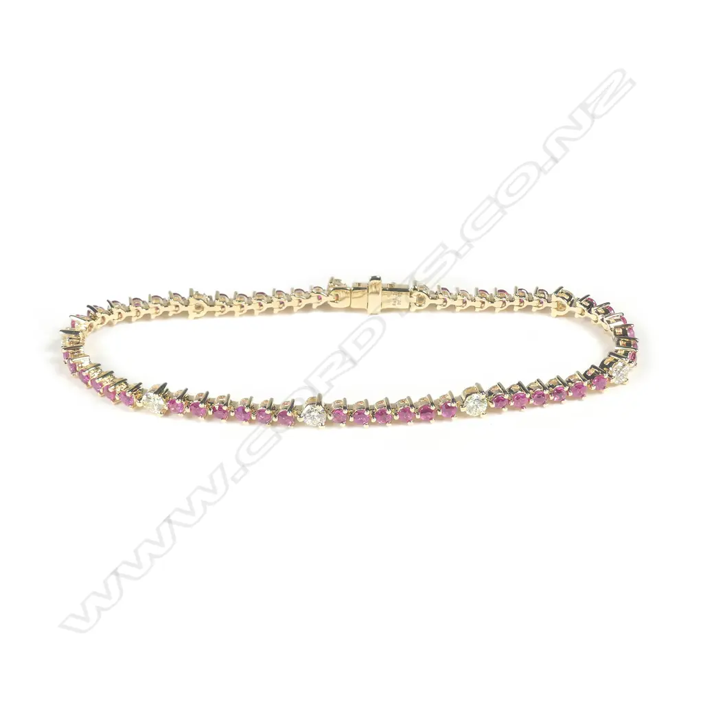 A 14ct gold ruby and diamond bracelet Image 1++