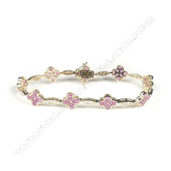 A 14ct gold ruby and diamond bracelet
