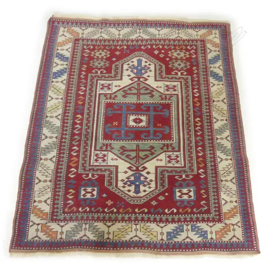A Turkish hand knotted rug