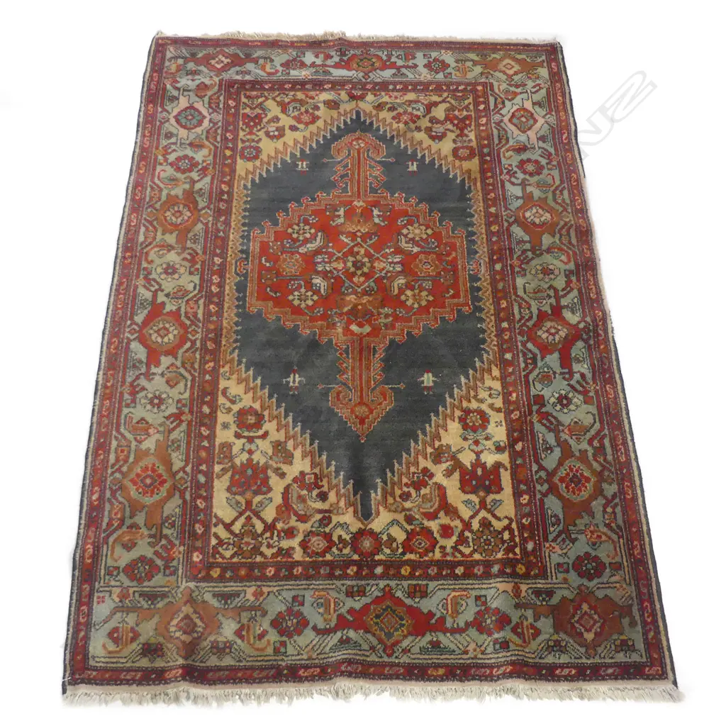 A hand knotted Persian rug Image 1++