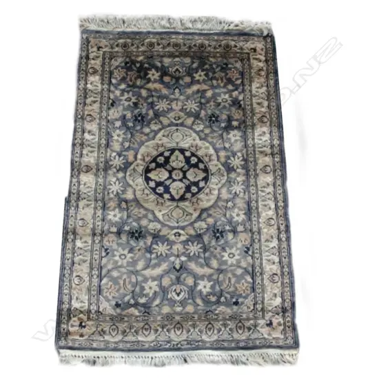 A small Isphahan hand knotted silk rug