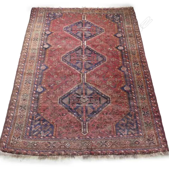 A Persian Shiraz hand knotted carpet