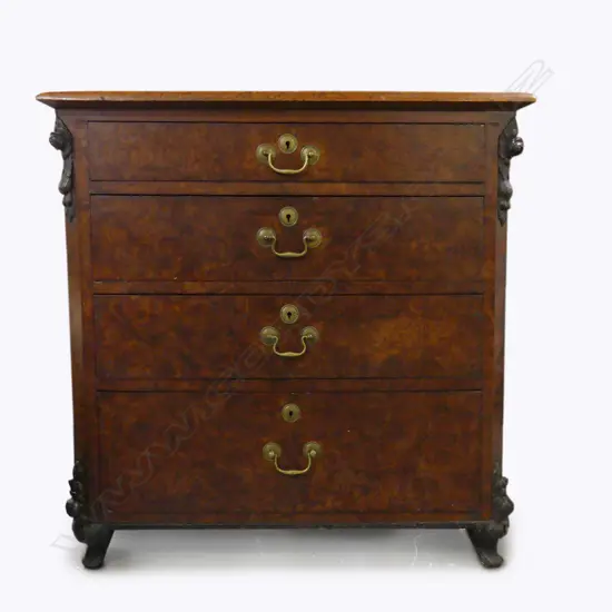 An unusually small-proportioned chest of four drawers