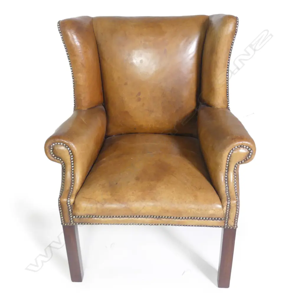 A pair of vintage leather wingback armchairs Image 1++