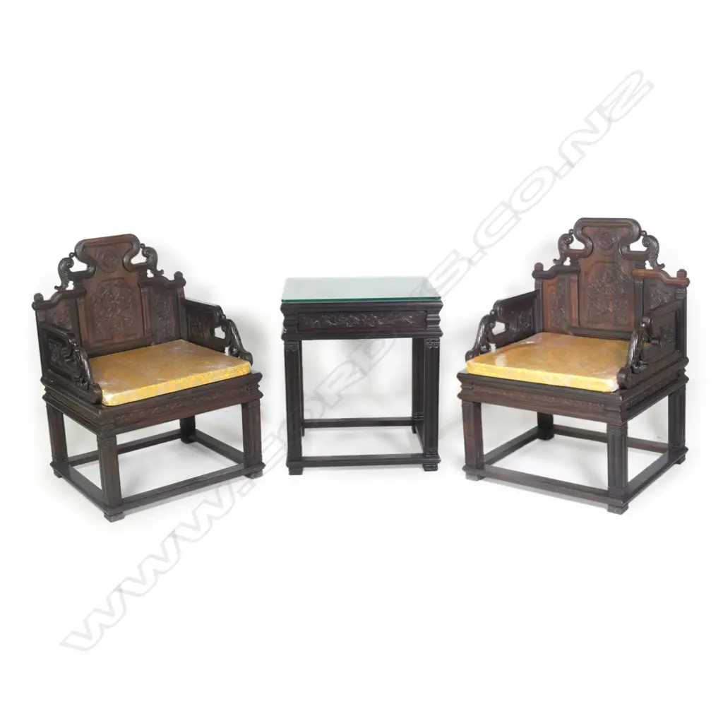 A Beijing red sandalwood pair of chairs and conforming table set Image 1++