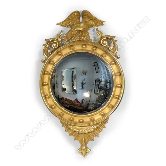 An impressive vintage Empire style convex mirror