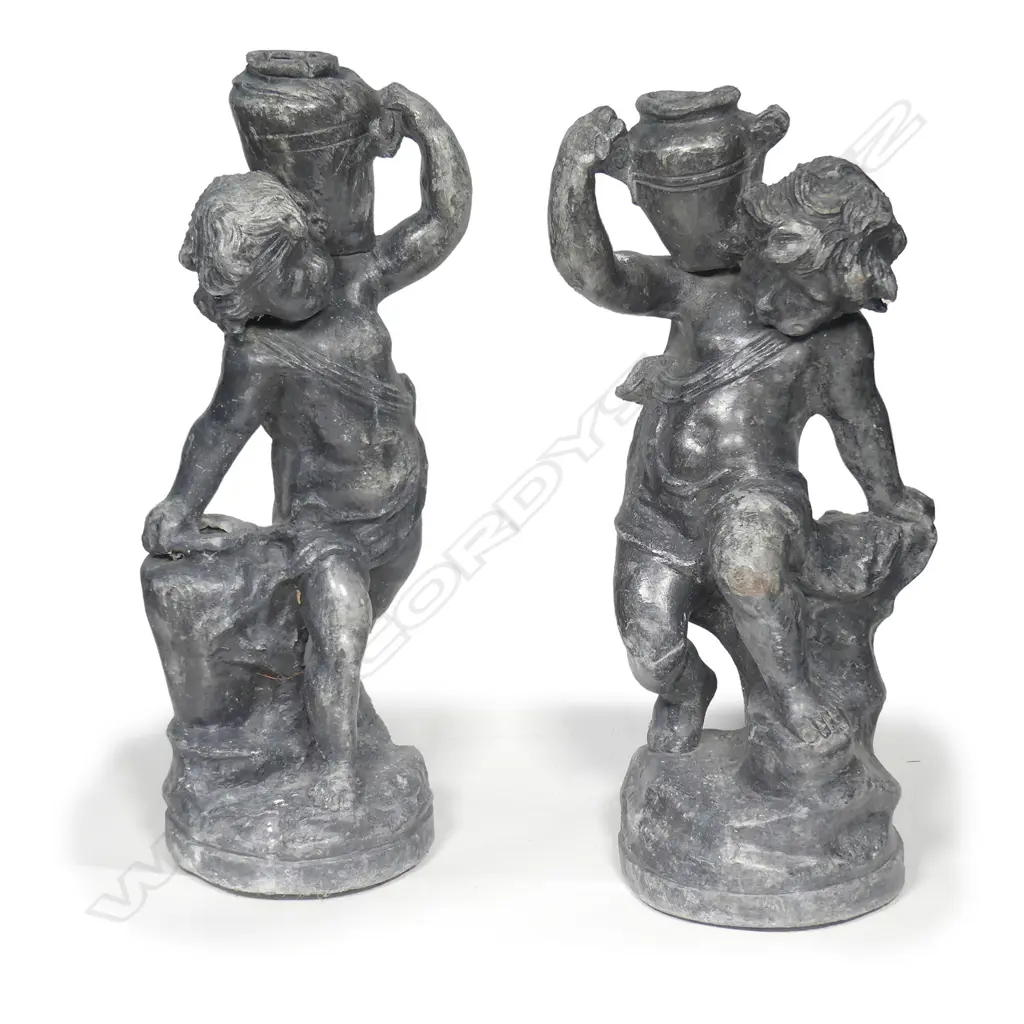 A pair of early Georgian lead garden statuettes Image 1++