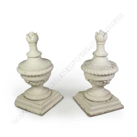 A pair of vintage white painted terracotta garden/gateway finials