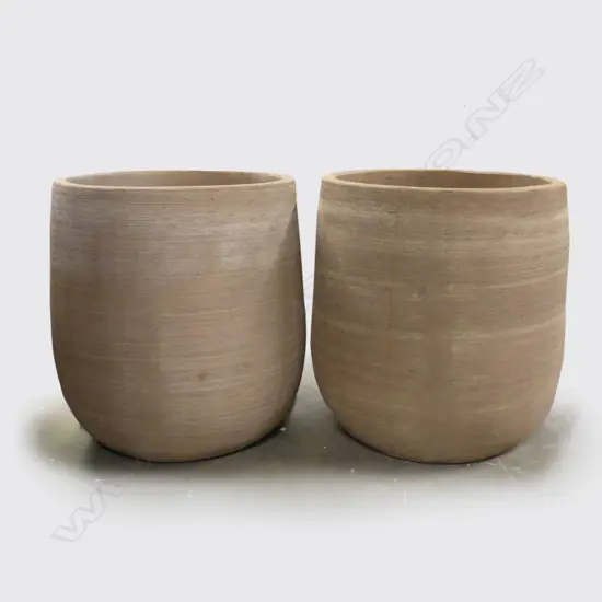 A pair of large ovoid garden pots