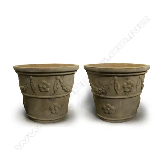 A pair of large terracotta tapered French style pots