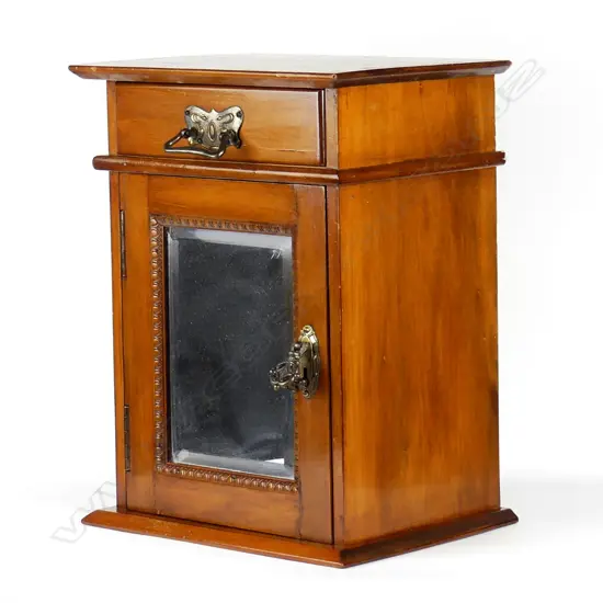 An Edwardian rimu smoker's cabinet