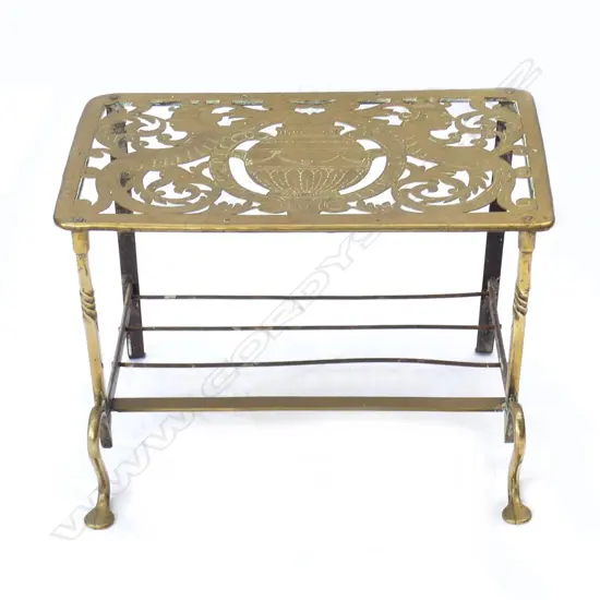 A Georgian brass trivet