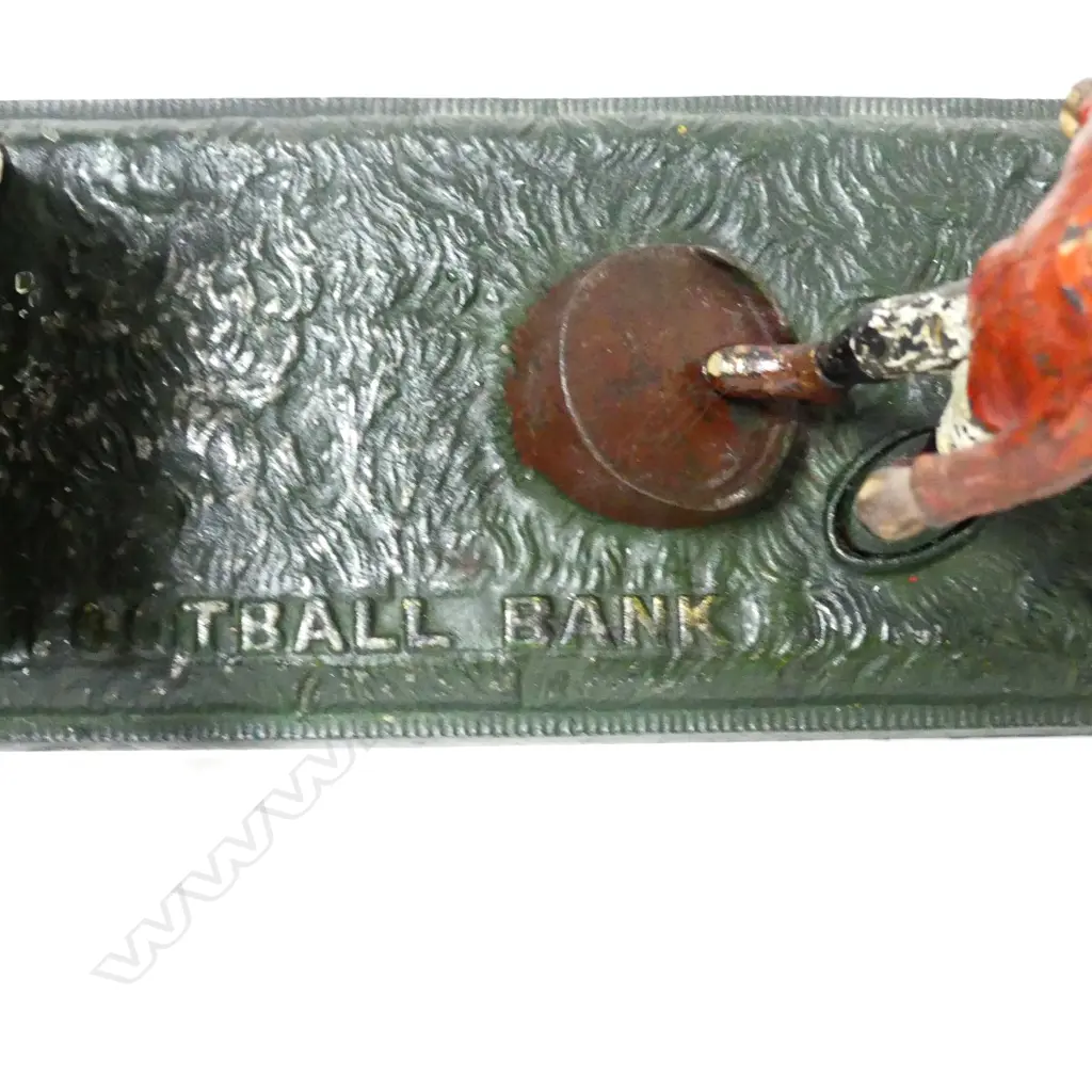 A vintage cast iron money bank Image 1++